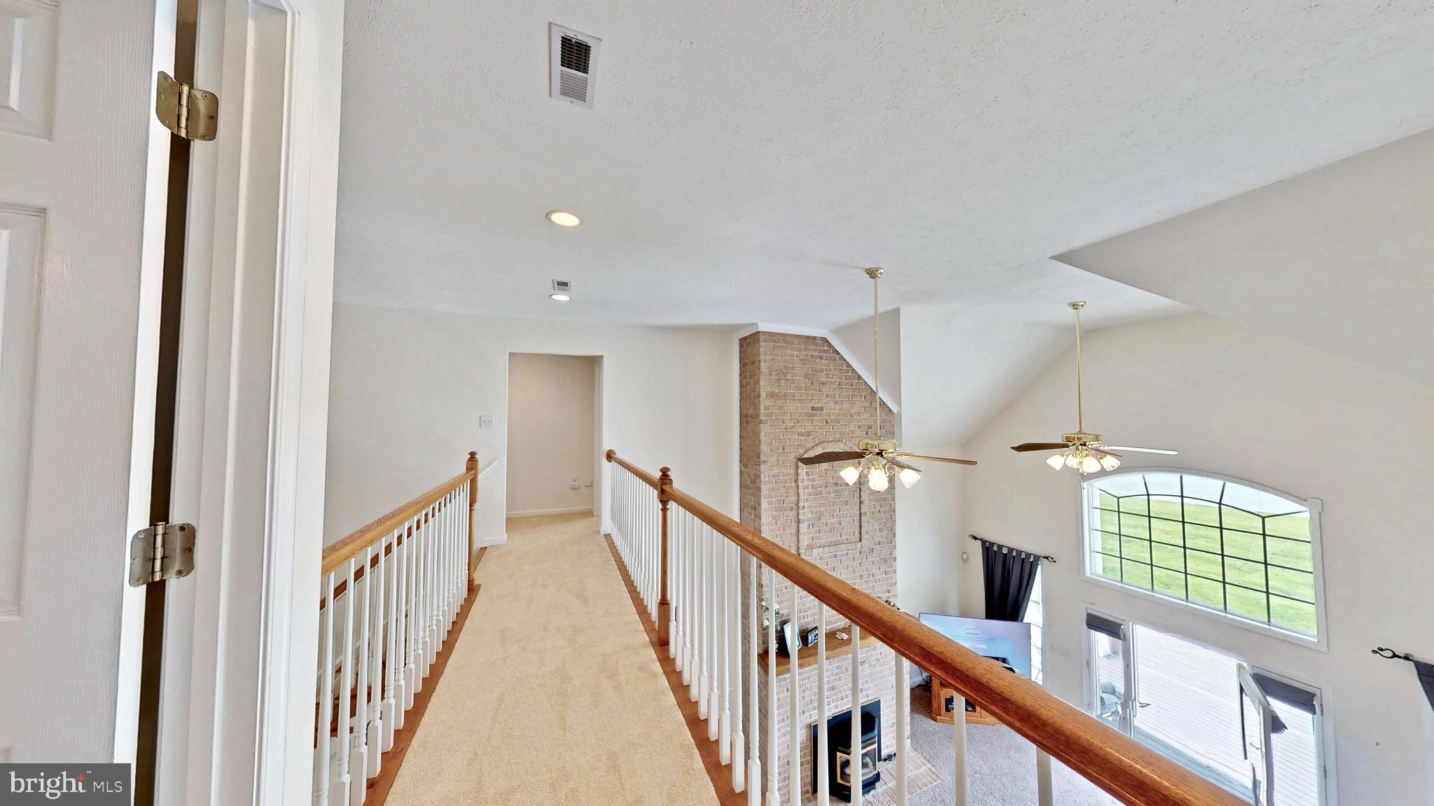 13785 Waverly Point Road Newburg, MD 20664 - Photo 55 of 65 Upper Level - Hall over looking family room