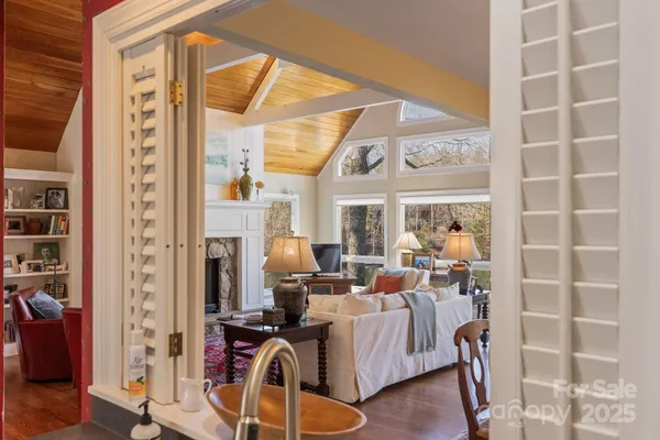a view of a livingroom with furniture and front door