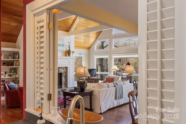 a view of a livingroom with furniture and front door