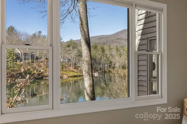 a bathroom with a shower curtain and a sink