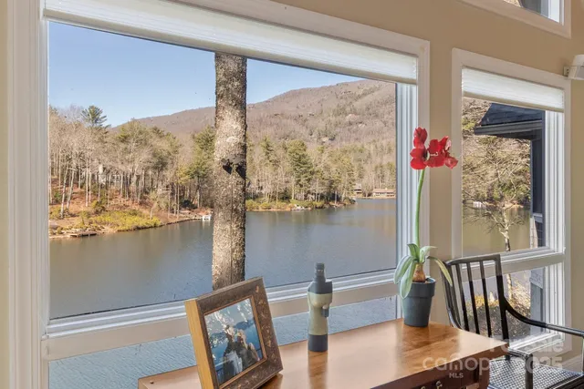 a view of a balcony with furniture