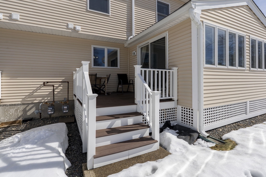 216 Rangeway Road, Unit 133 North Billerica, MA 01862 - Photo 34 of 42 a view of a house with wooden floor and wooden fence