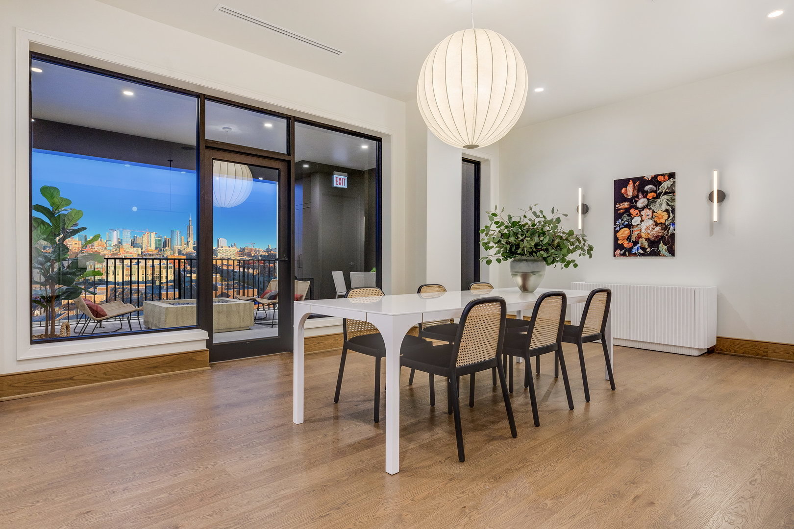 21 North May Street, Unit 702 Chicago, IL 60607 - Photo 7 of 26 a view of a dining room with furniture wooden floor and chandelier