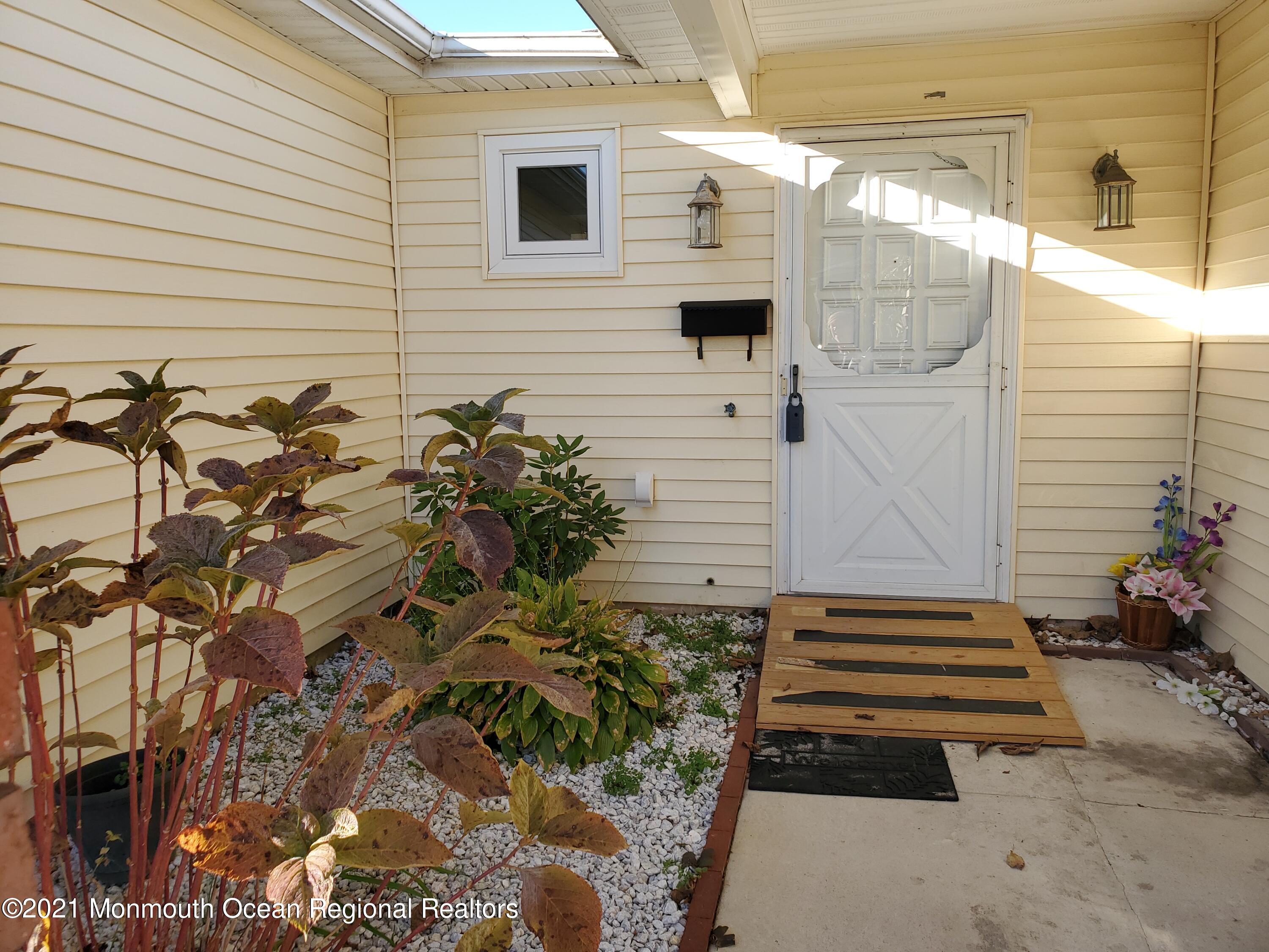 37 Patmore Road Brick, NJ 08724 - Photo 3 of 19 a view of a entryway door of the house