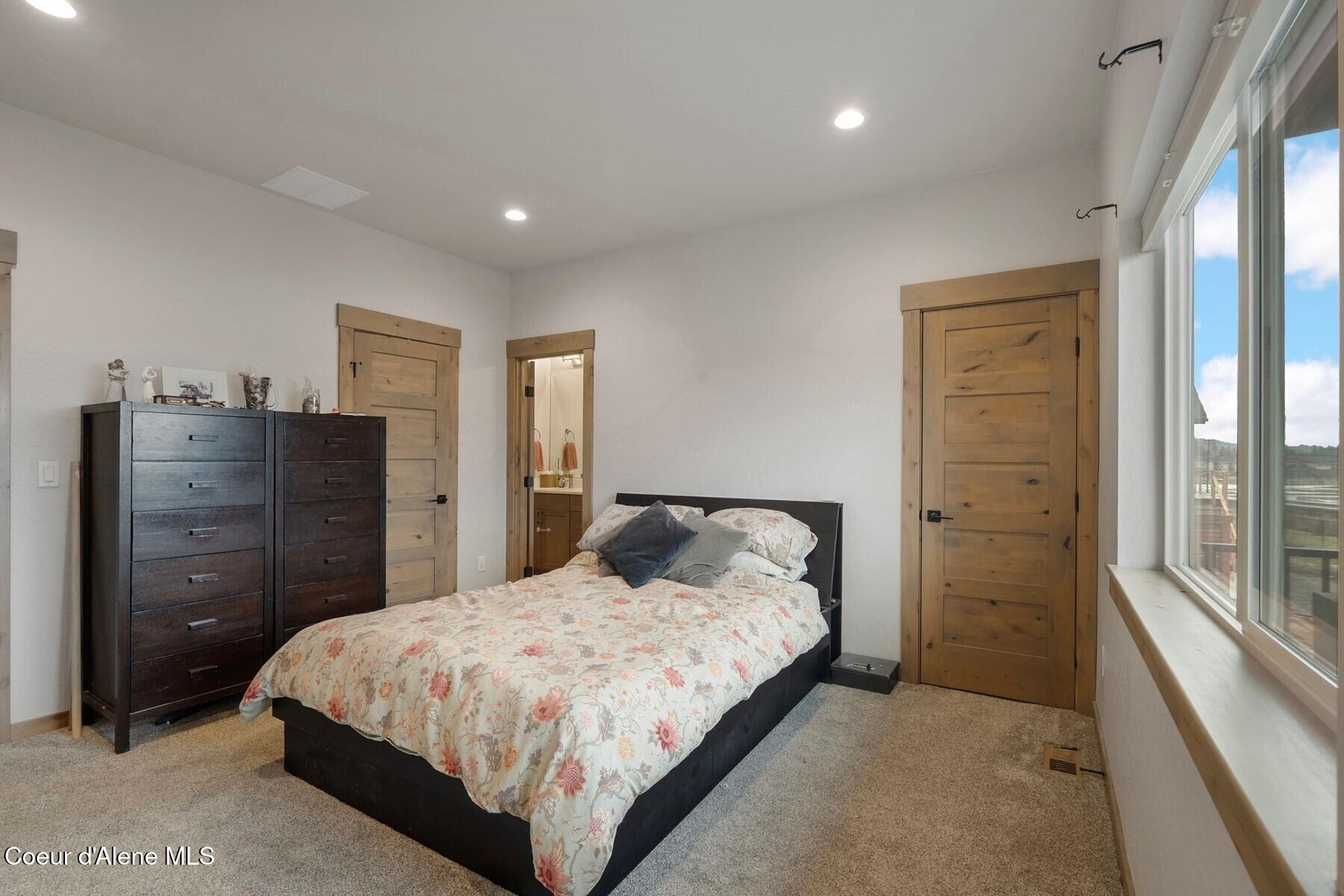 3212 Goodman Drive Sandpoint, ID 83864 - Photo 16 of 29 Primary Bedroom