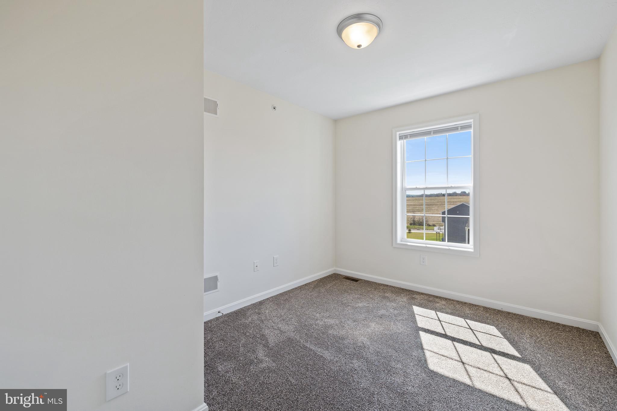 788 Rising Sun Lane Chambersburg, PA 17202 - Photo 17 of 25 a view of an empty room with a window