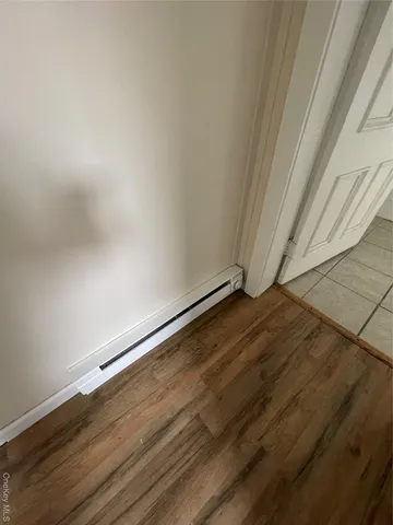 a bathroom with a shower and toilet