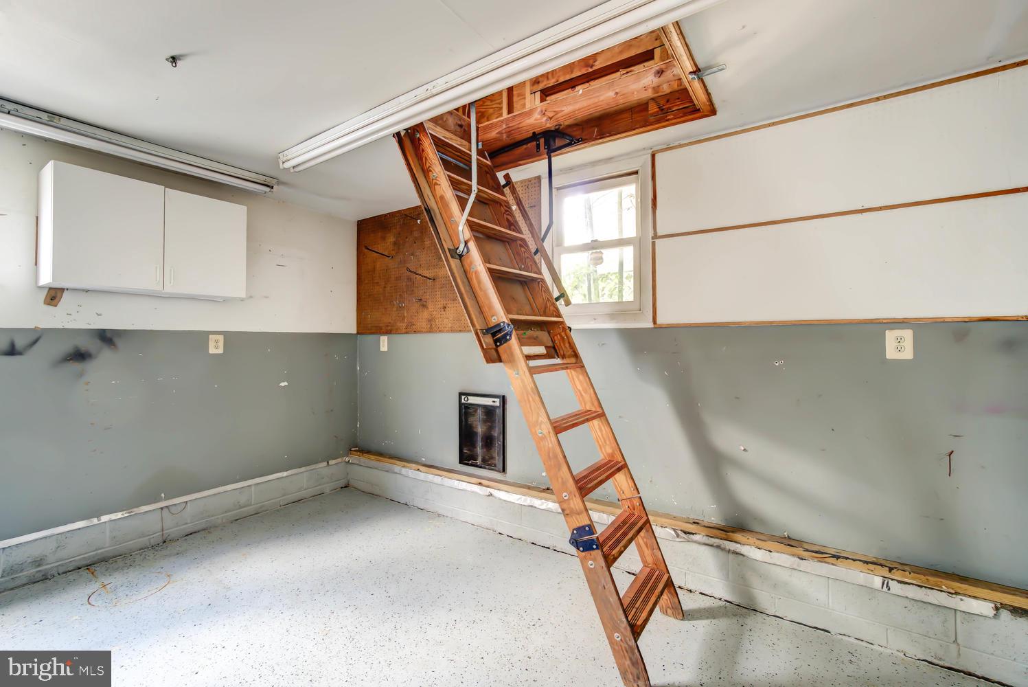 2900 Franklin Road Arlington, VA 22201 - Photo 67 of 75 Stairs to attic in the garage