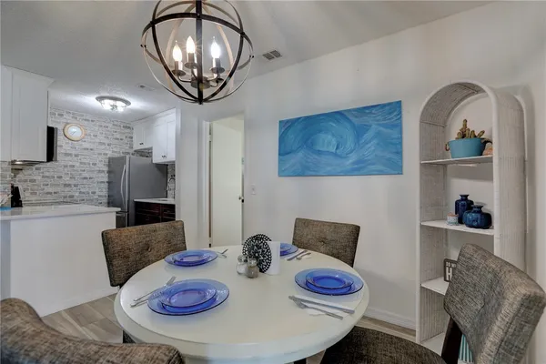 a view of a dining room with furniture