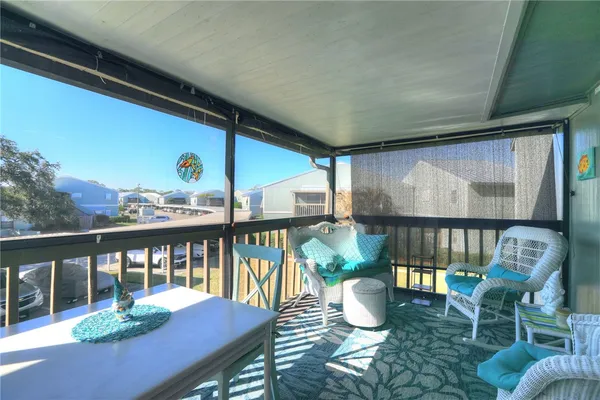 a view of a balcony dining area