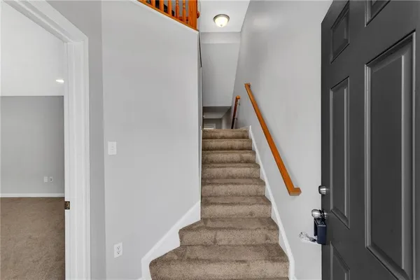 a view of staircase with white walls and white walls