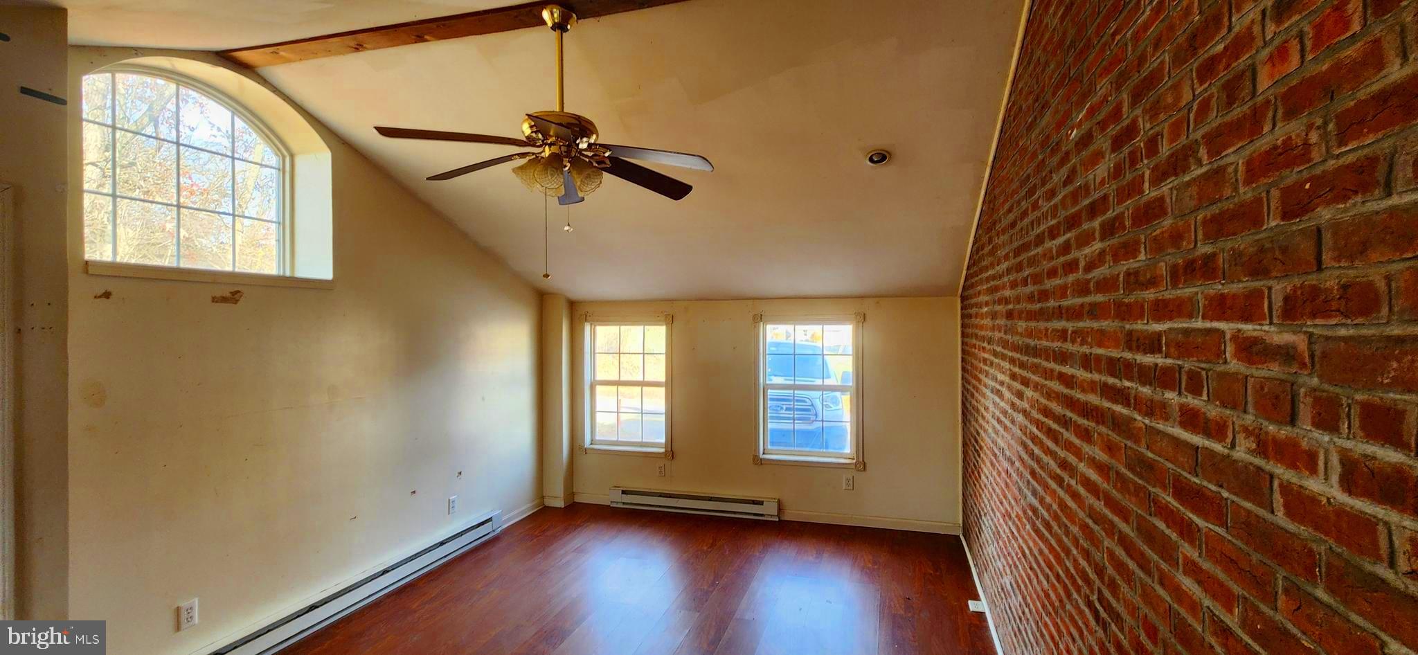 734 Bridgeport Road Landisburg, PA 17040 - Photo 25 of 39 a view of empty room with wooden floor and fan