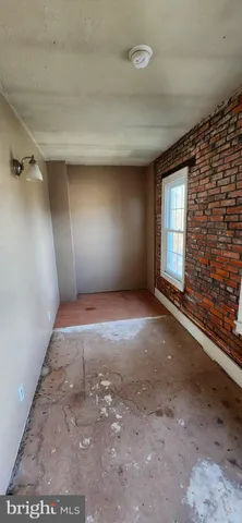 a view of hallway with windows