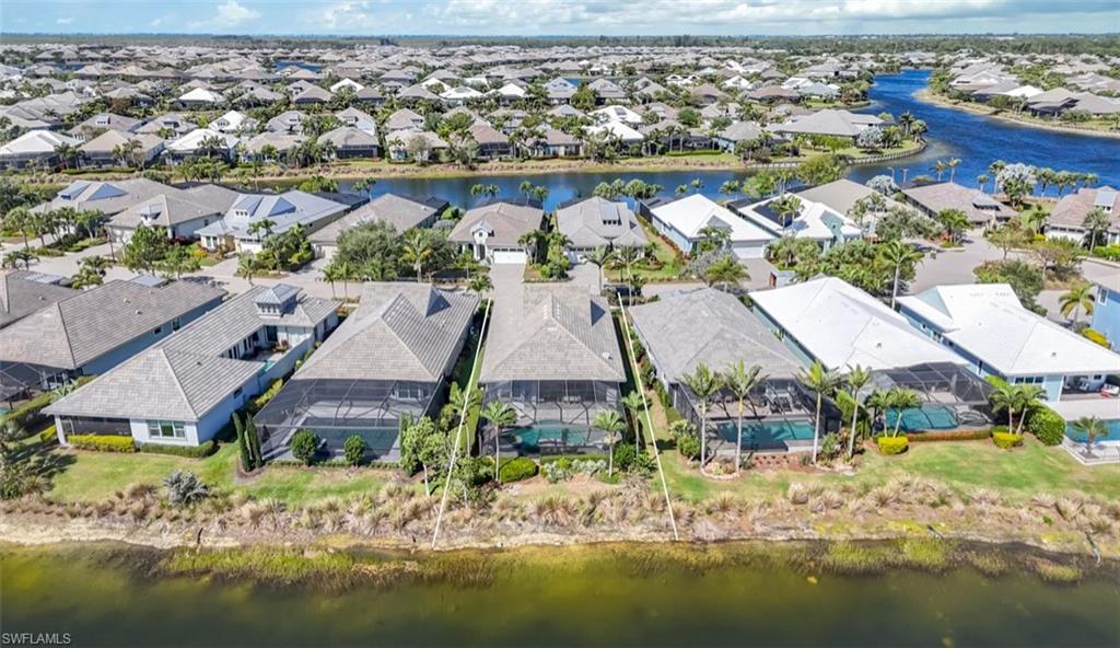 6466 Warwick Avenue Naples, FL 34113 - Photo 26 of 43 an aerial view of residential houses with outdoor space