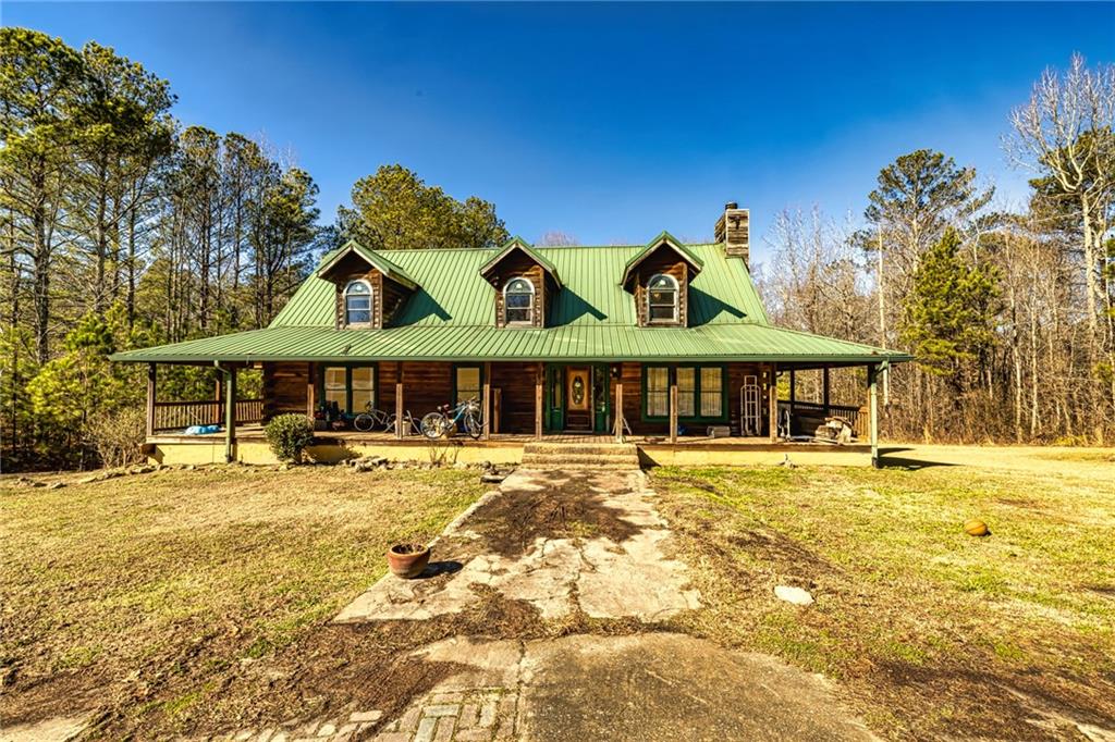 1207 5 Points Road Waco, GA 30182 - Photo 1 of 1 a front view of a house with swimming pool
