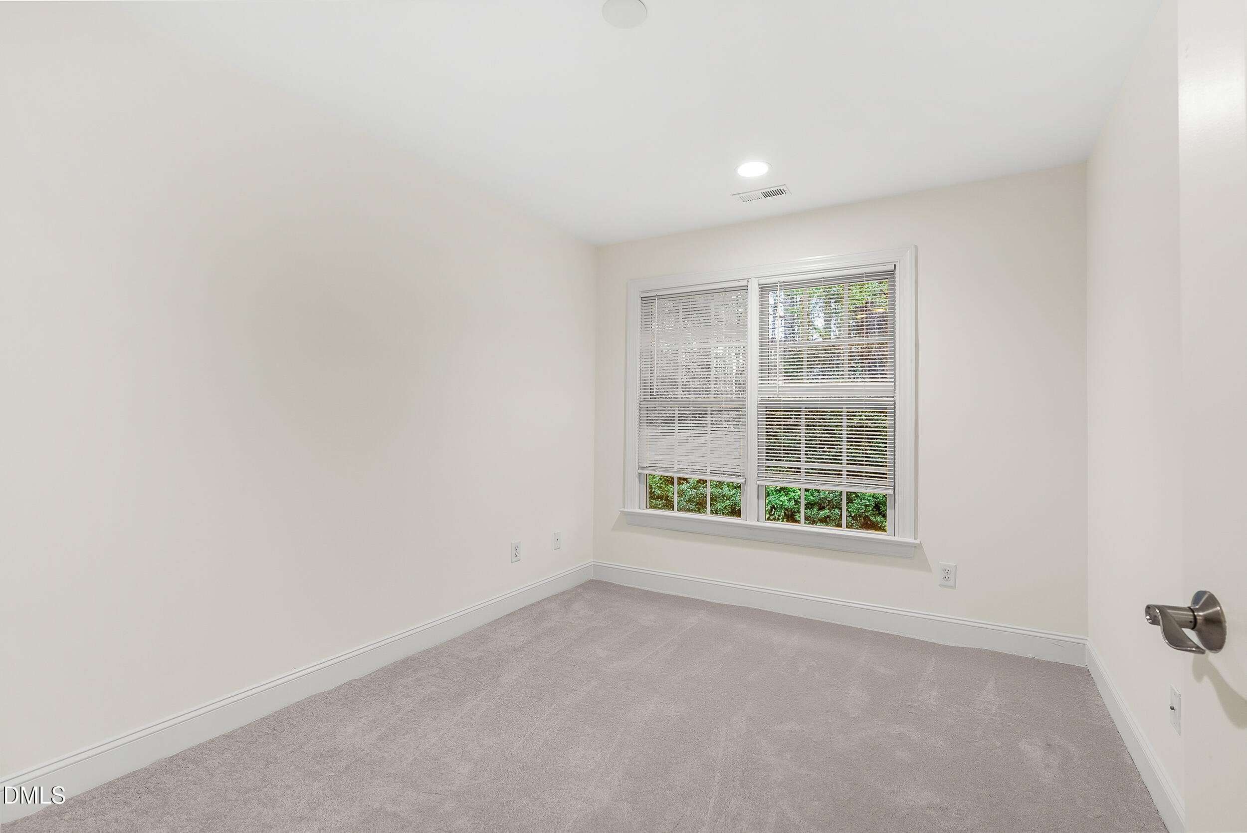 2822 Pickett Road, Unit 154 Durham, NC 27705 - Photo 19 of 31 an empty room with windows