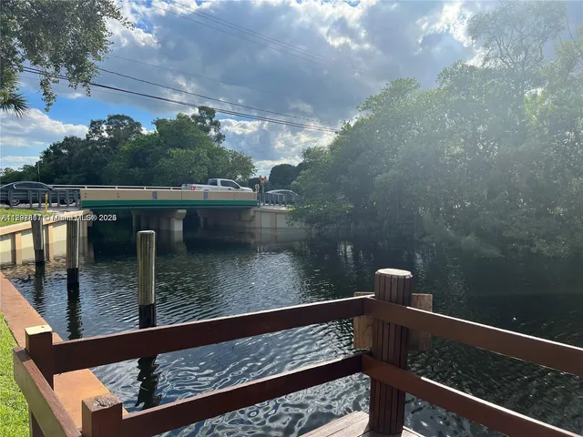 a view of balcony with furniture
