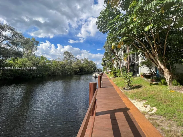 a view of a lake with a large trees