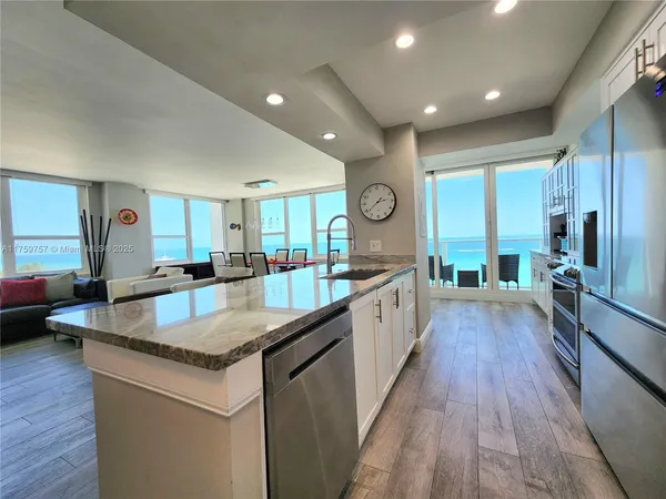 a view of a kitchen with a sink