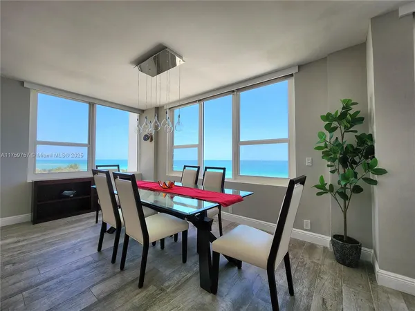 a room with furniture and wooden floor