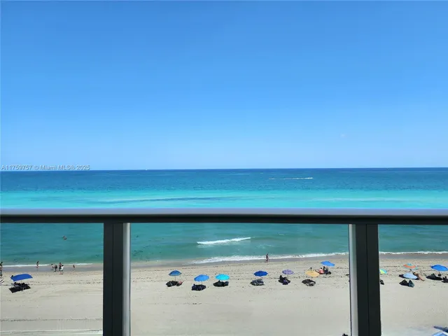 a kitchen with a refrigerator and a sink
