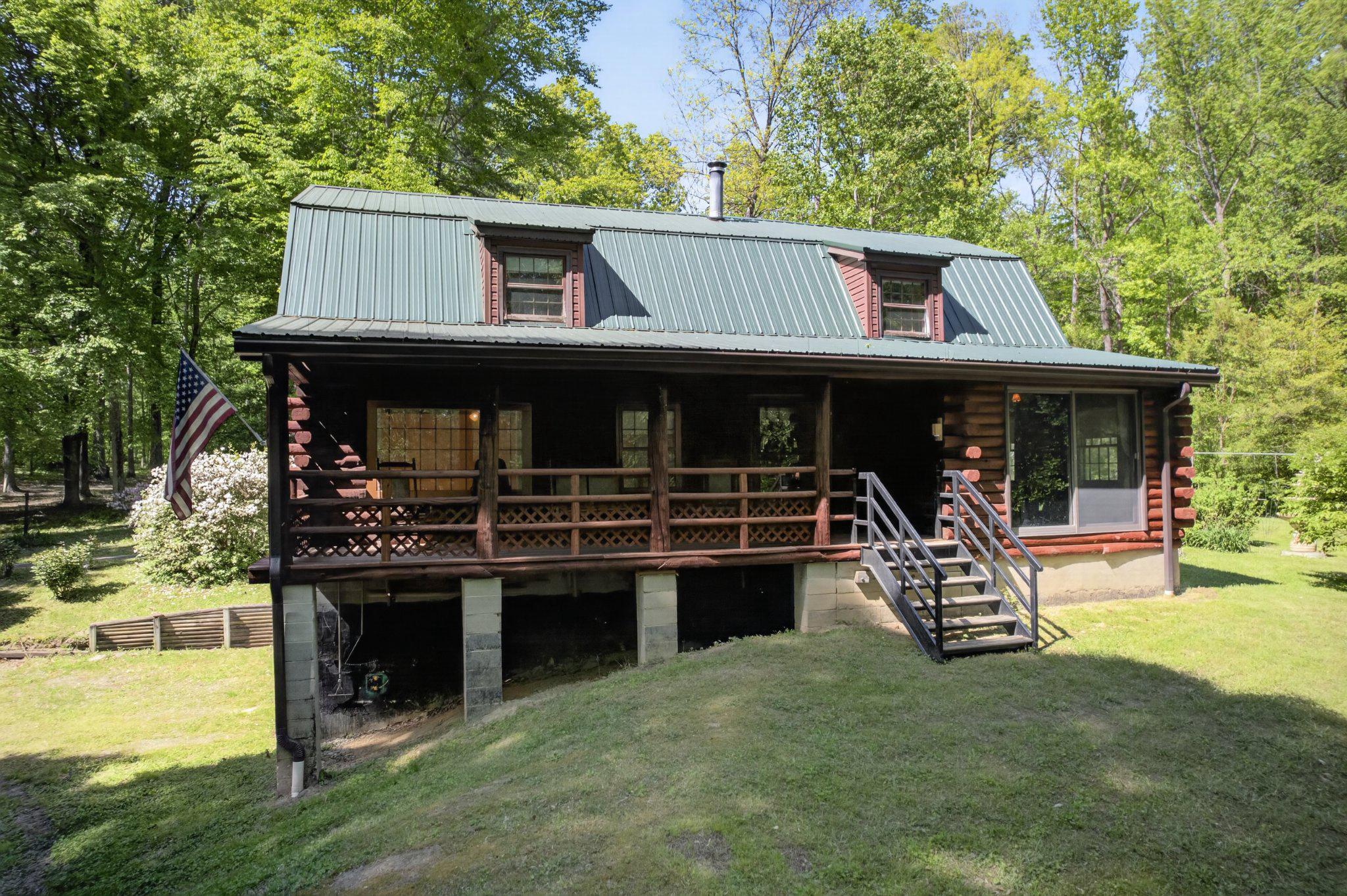 403 Union Church Road Townsend, DE 19734 - Photo 4 of 73 Charming log cabin nestled in nature.
