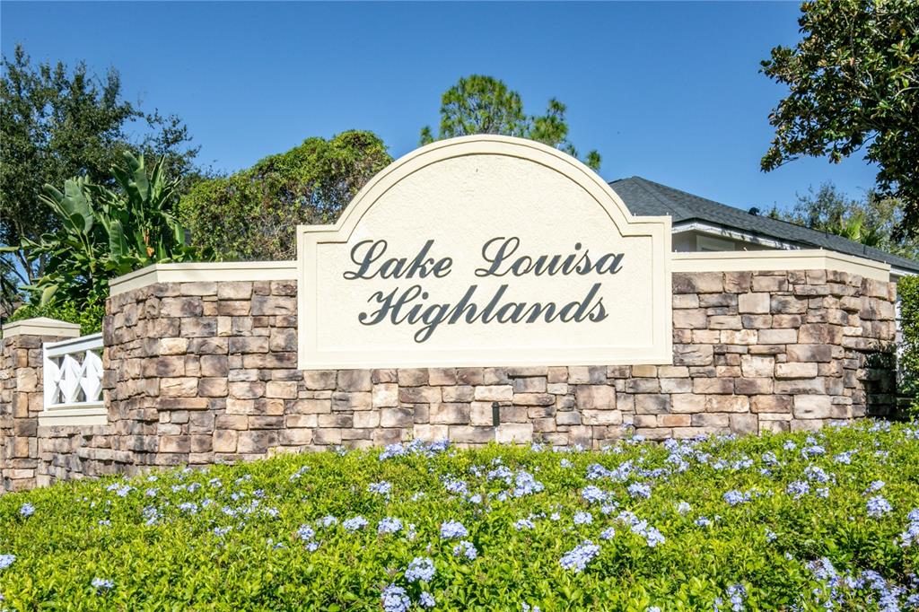 13320 Via Roma Circle Clermont, FL 34711 - Photo 23 of 26 a sign that is on the side of a building