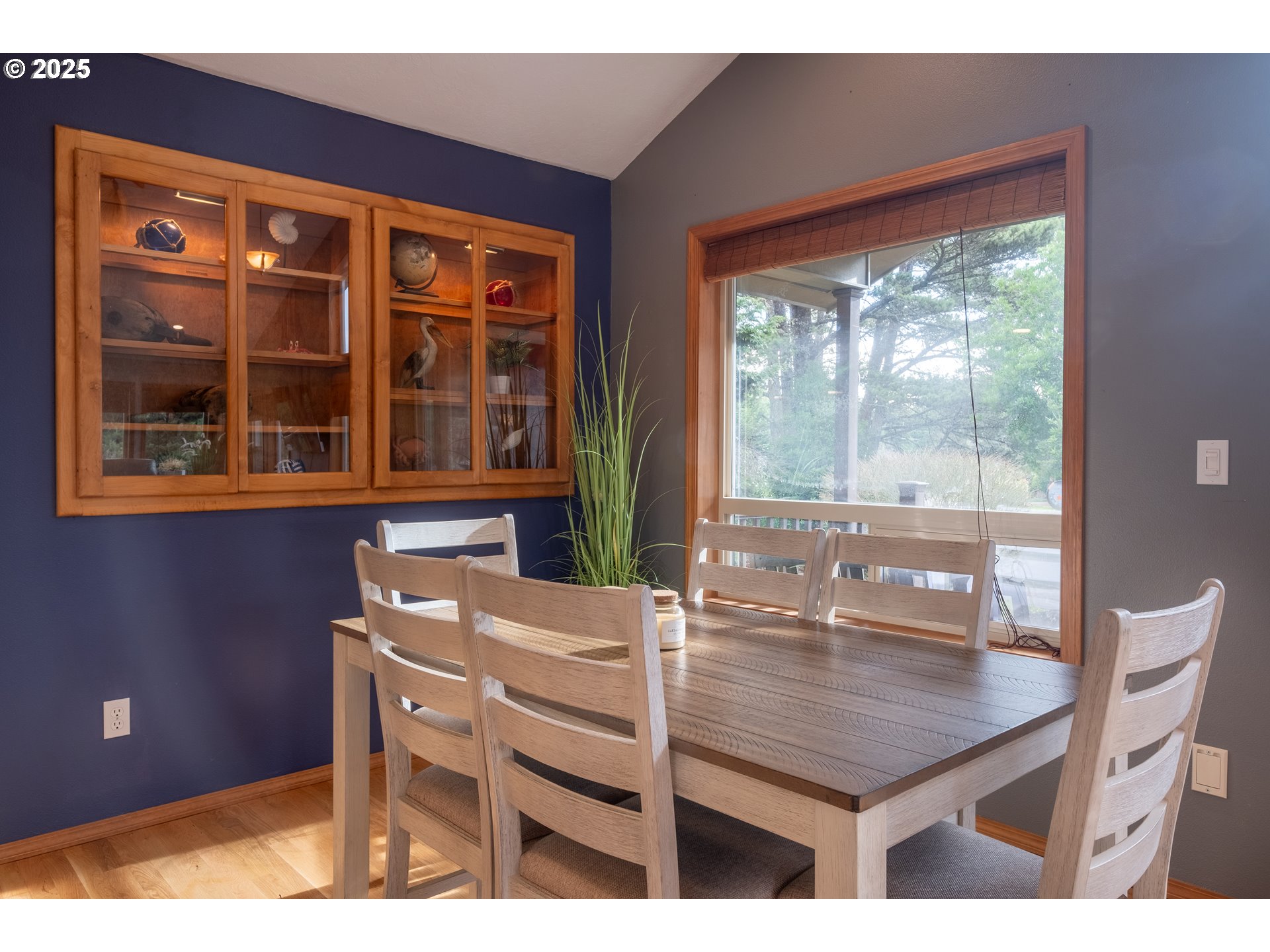760 Southwest Range Drive Waldport, OR 97394 - Photo 14 of 30 a dining room with a table and chairs
