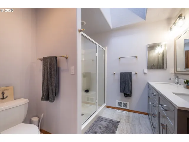 a bathroom with a sink and mirror