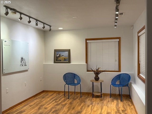 760 Southwest Range Drive Waldport, OR 97394 - Photo 24 of 30 a room with furniture and a window