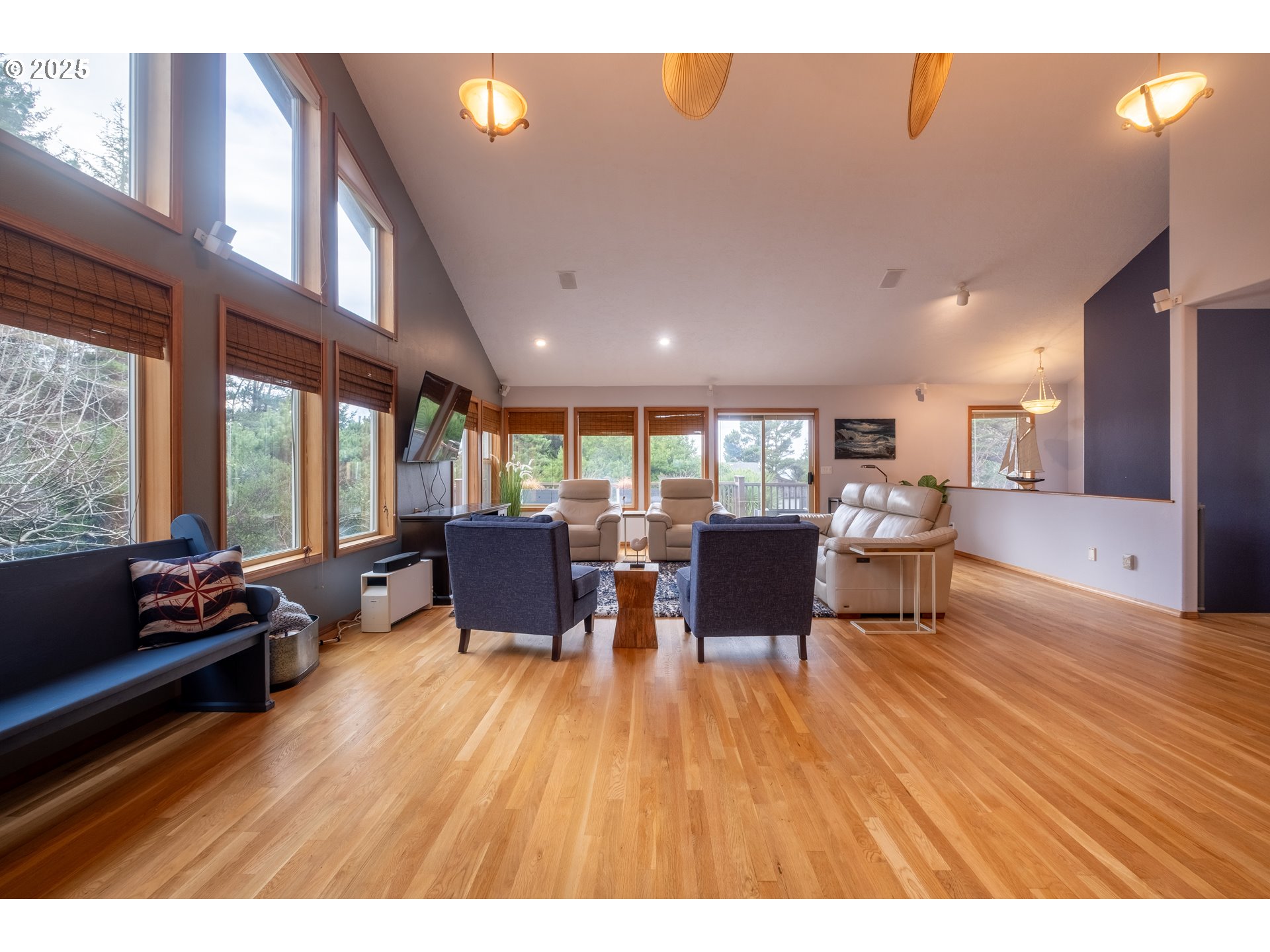 760 Southwest Range Drive Waldport, OR 97394 - Photo 6 of 30 a living room with furniture and a large window