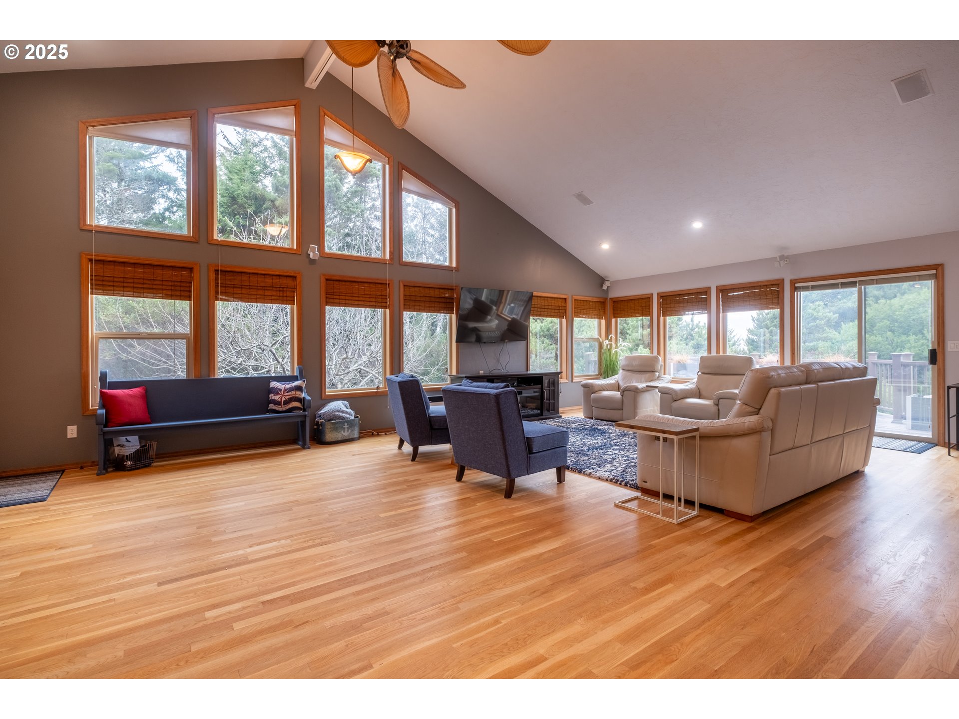 760 Southwest Range Drive Waldport, OR 97394 - Photo 8 of 30 a living room with furniture and a large window