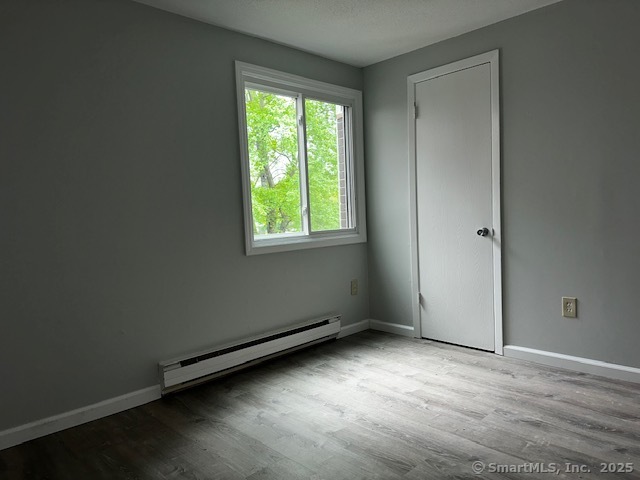 7 Padanaram Road, Unit J232 Danbury, CT 06811 - Photo 13 of 26 an empty room with a window