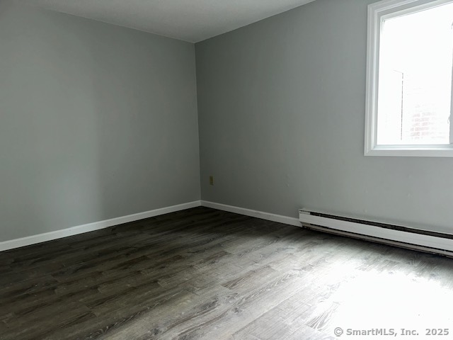 7 Padanaram Road, Unit J232 Danbury, CT 06811 - Photo 16 of 26 a view of an empty room and window