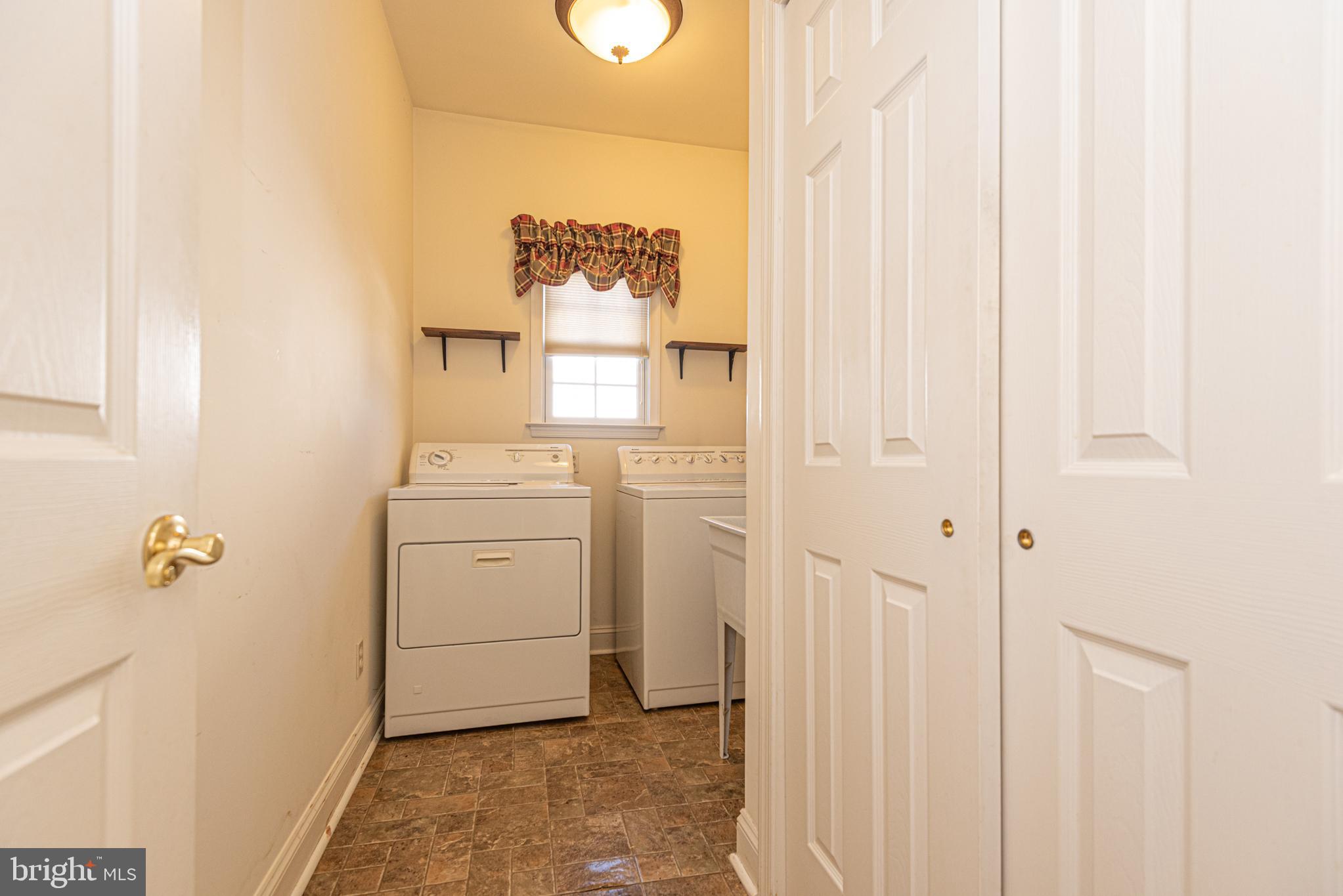 6023 Tarry Town Road Salisbury, MD 21801 - Photo 54 of 61 Bright and functional laundry space.