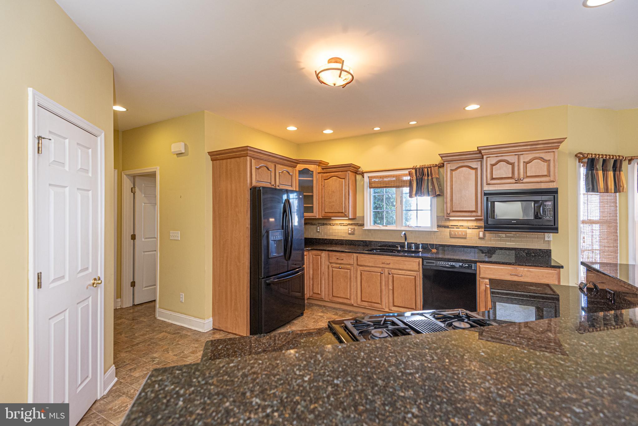 6023 Tarry Town Road Salisbury, MD 21801 - Photo 8 of 61 Bright and inviting kitchen with modern finishes.