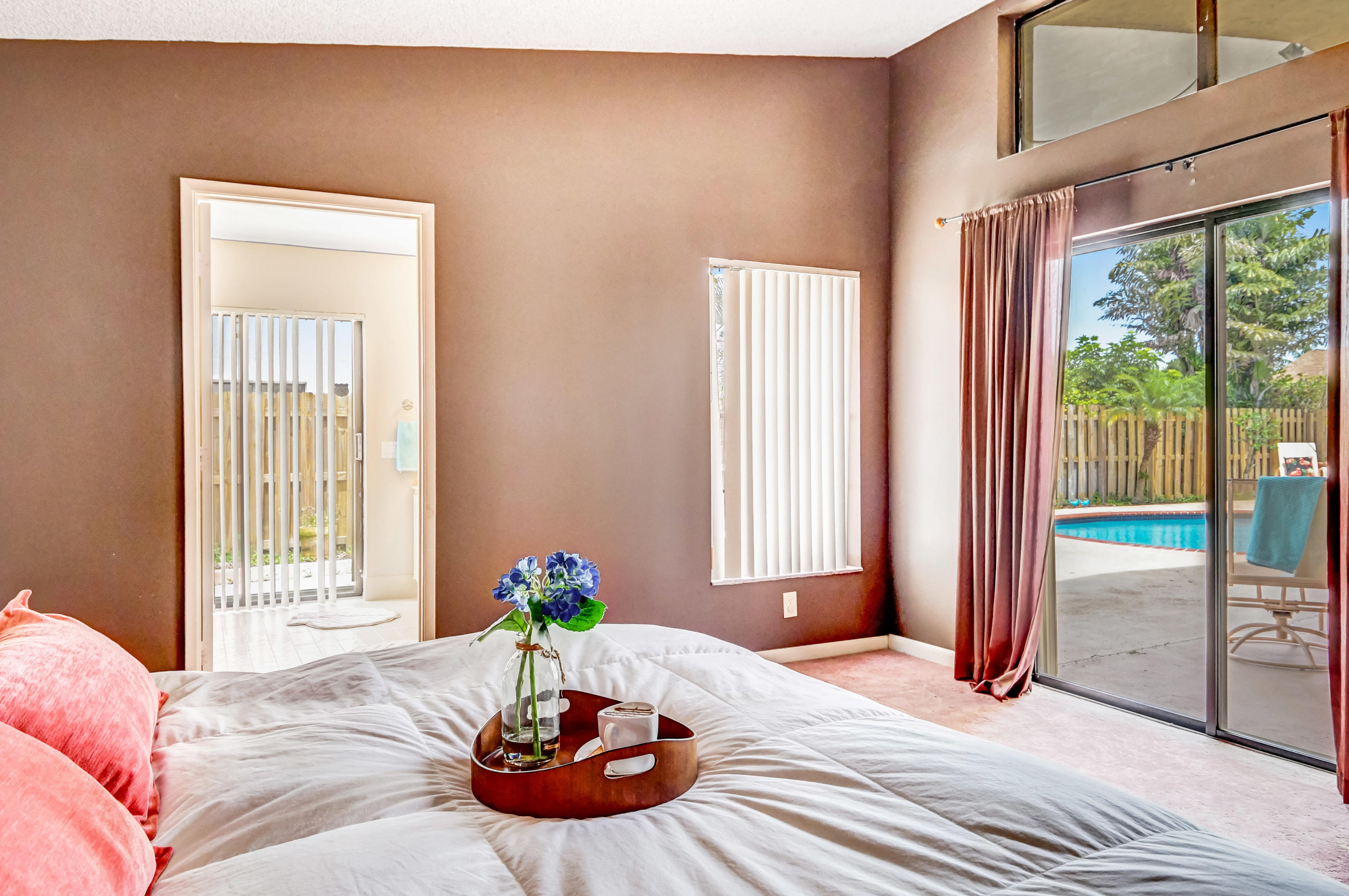 21080 Windemere Lane Boca Raton, FL 33428 - Photo 32 of 97 a bedroom with a bed and a window
