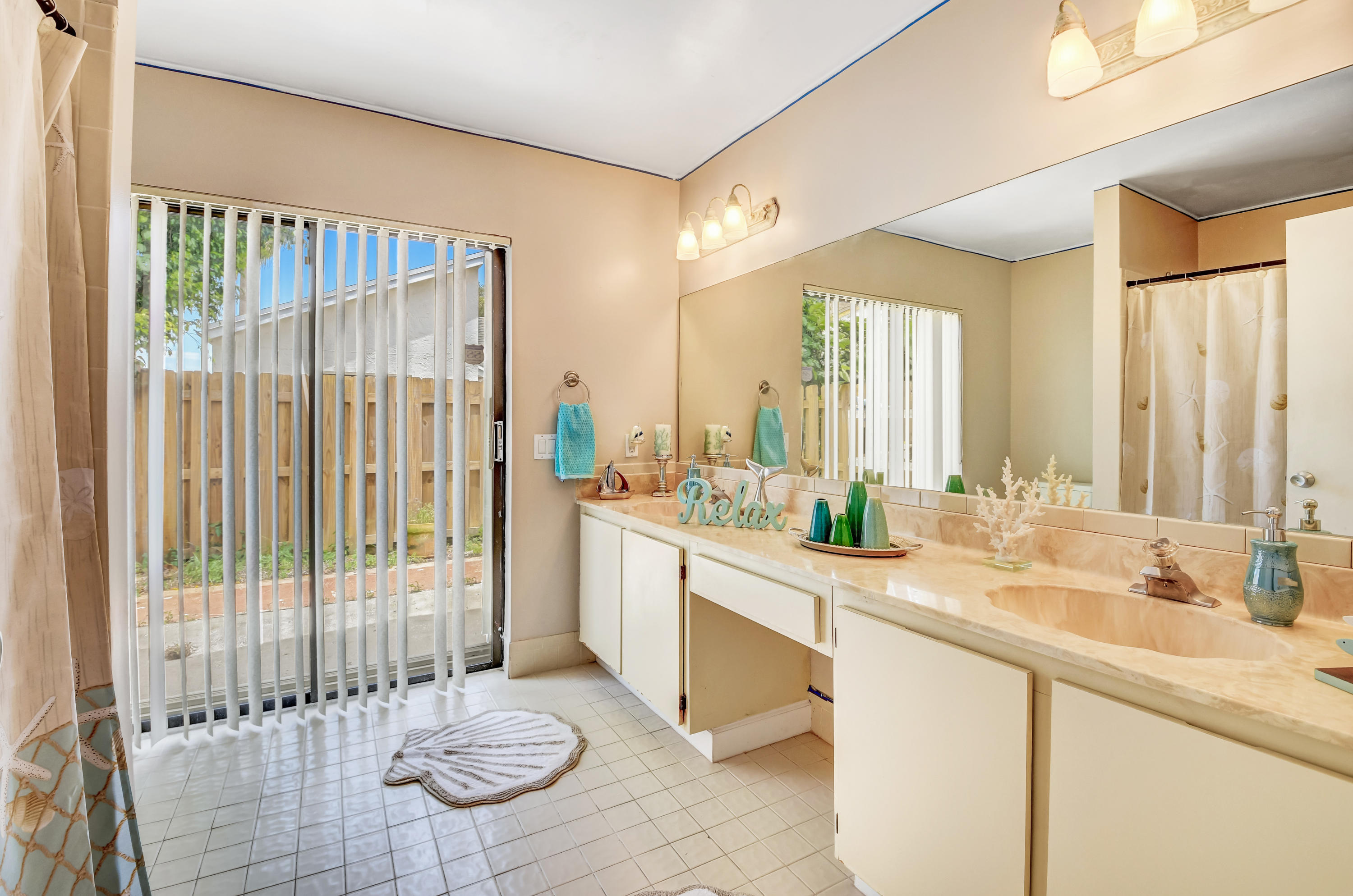 21080 Windemere Lane Boca Raton, FL 33428 - Photo 34 of 97 a bathroom with a double vanity sink and a mirror
