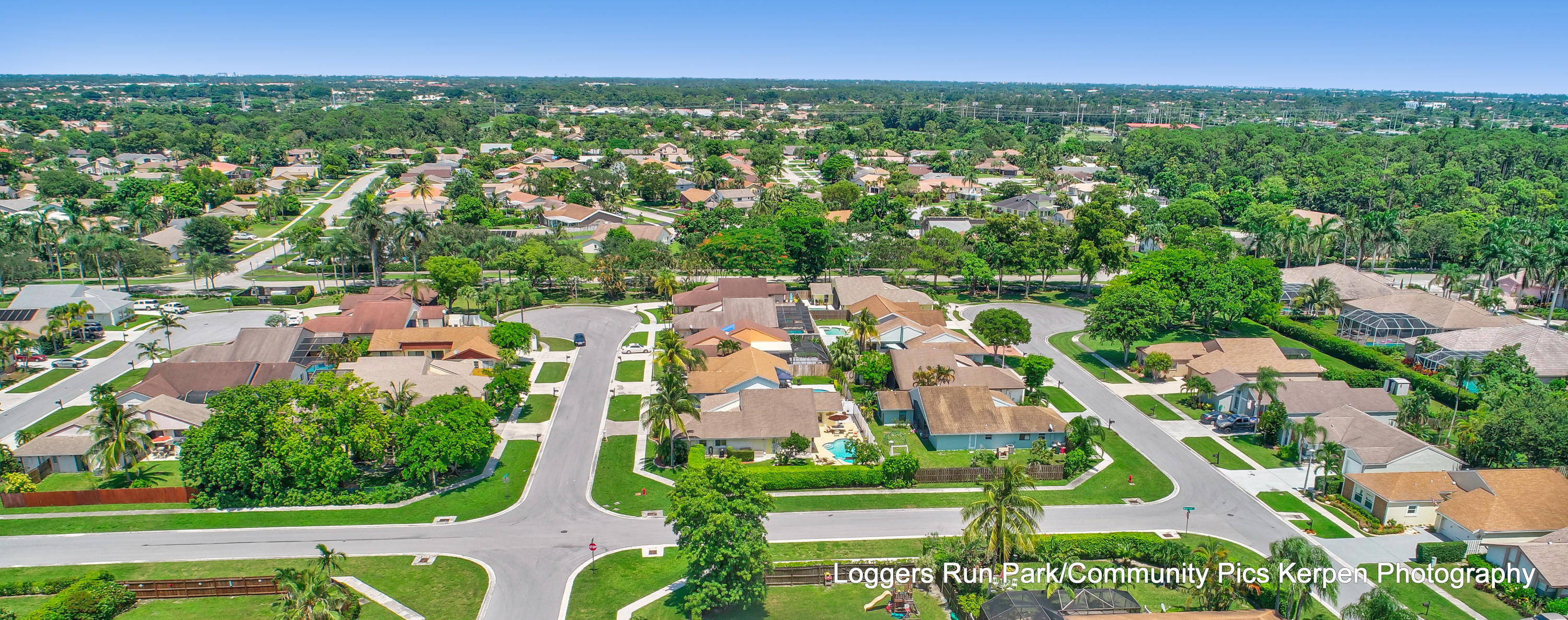 21080 Windemere Lane Boca Raton, FL 33428 - Photo 94 of 97 an aerial view of residential houses with outdoor space and trees
