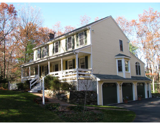 25 Grants Mill Road Wrentham, MA 02093 - Photo 1 of 1 a front view of residential houses with yard