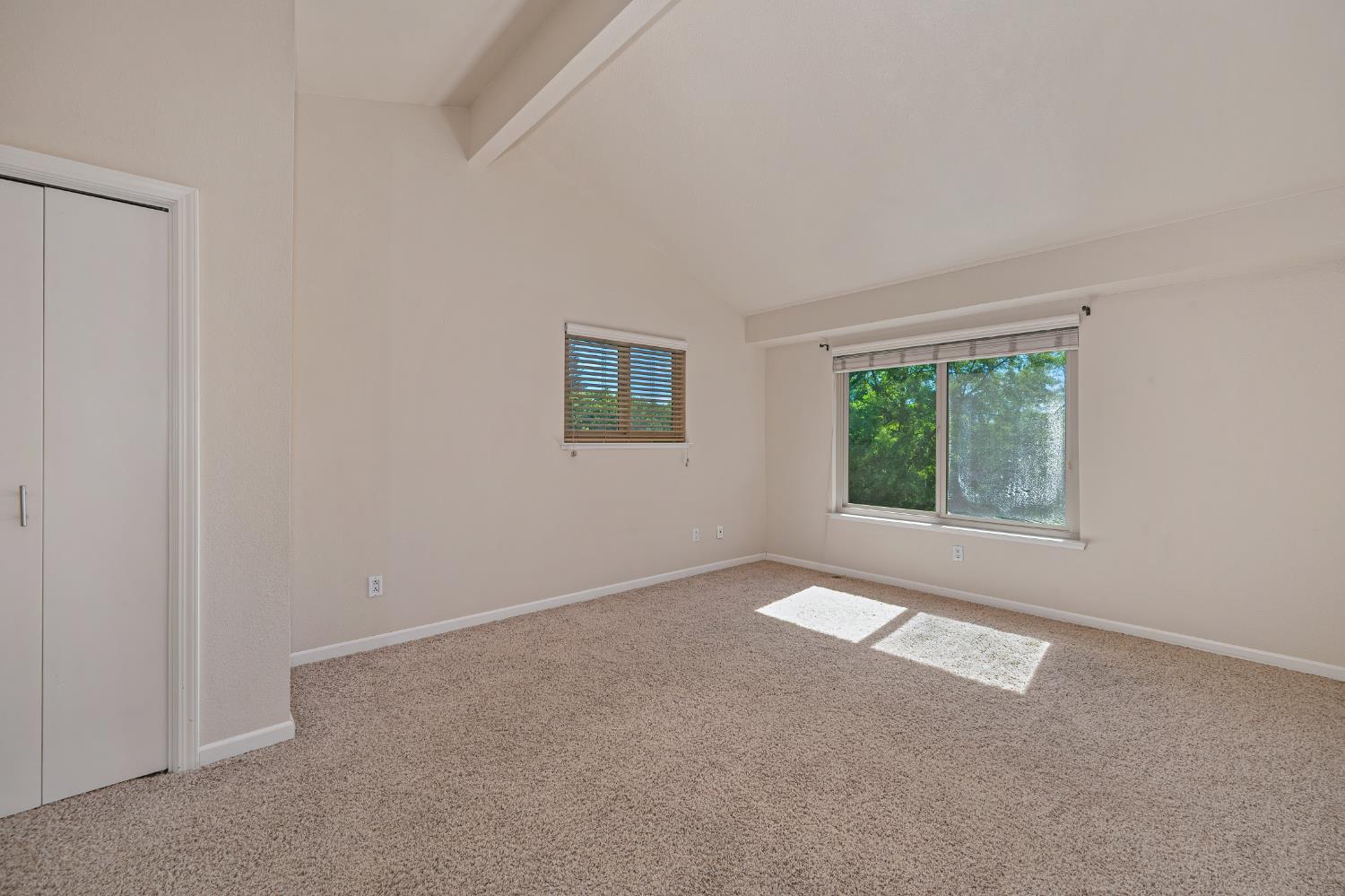 6986 Carreta Lane Rancho Murieta, CA 95683 - Photo 25 of 47 an empty room with windows