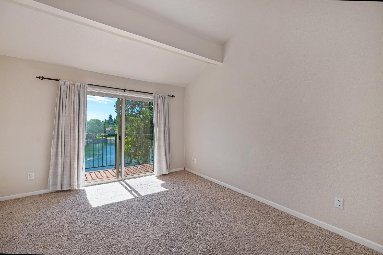 6986 Carreta Lane Rancho Murieta, CA 95683 - Photo 28 of 47 a view of an empty room with glass door