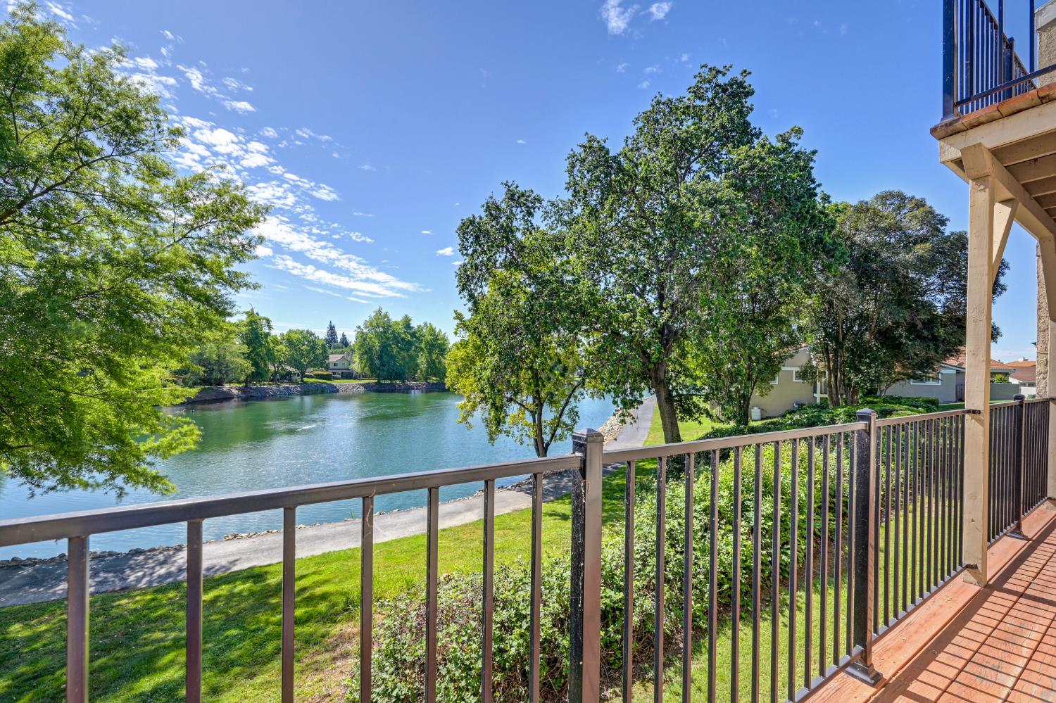 6986 Carreta Lane Rancho Murieta, CA 95683 - Photo 32 of 47 a view of lake from a balcony