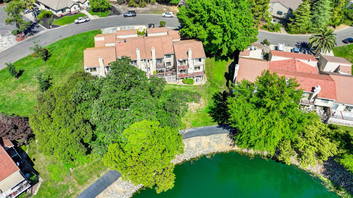6986 Carreta Lane Rancho Murieta, CA 95683 - Photo 39 of 47 an aerial view of a house with a garden