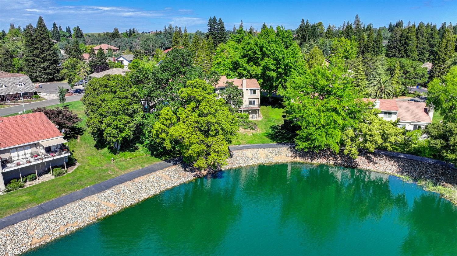 6986 Carreta Lane Rancho Murieta, CA 95683 - Photo 41 of 47 an aerial view of a house with a yard