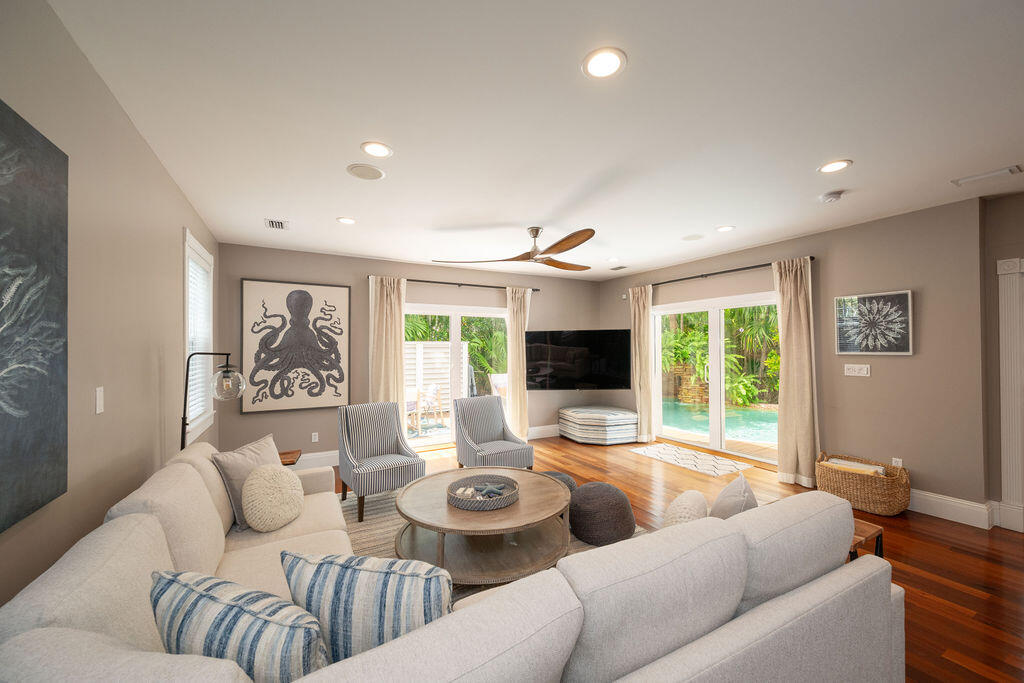 1320 South Street Key West, FL 33040 - Photo 11 of 36 a living room with furniture and a flat screen tv