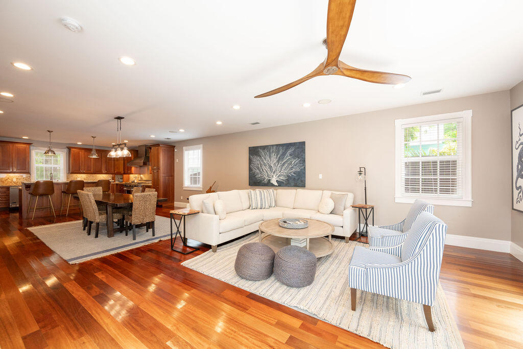 1320 South Street Key West, FL 33040 - Photo 13 of 36 a living room with furniture and a chandelier