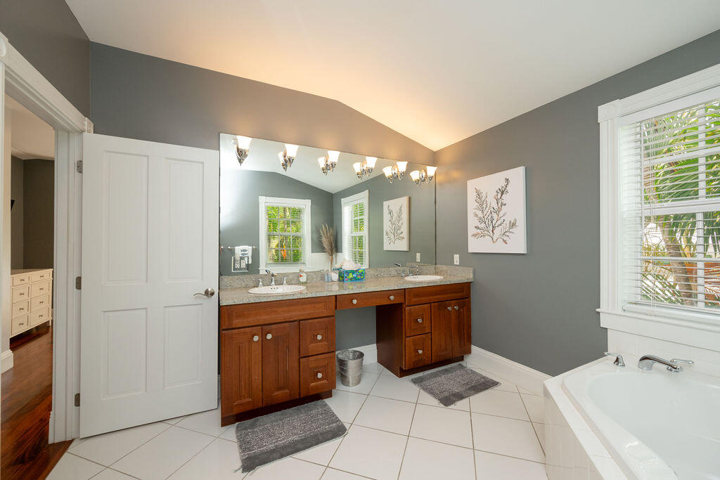 1320 South Street Key West, FL 33040 - Photo 21 of 36 a room with a sink and cabinets