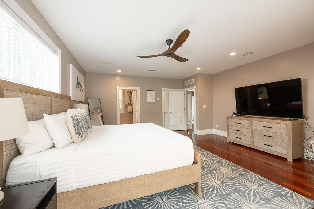 1320 South Street Key West, FL 33040 - Photo 23 of 36 a bedroom with a bed and a flat screen tv