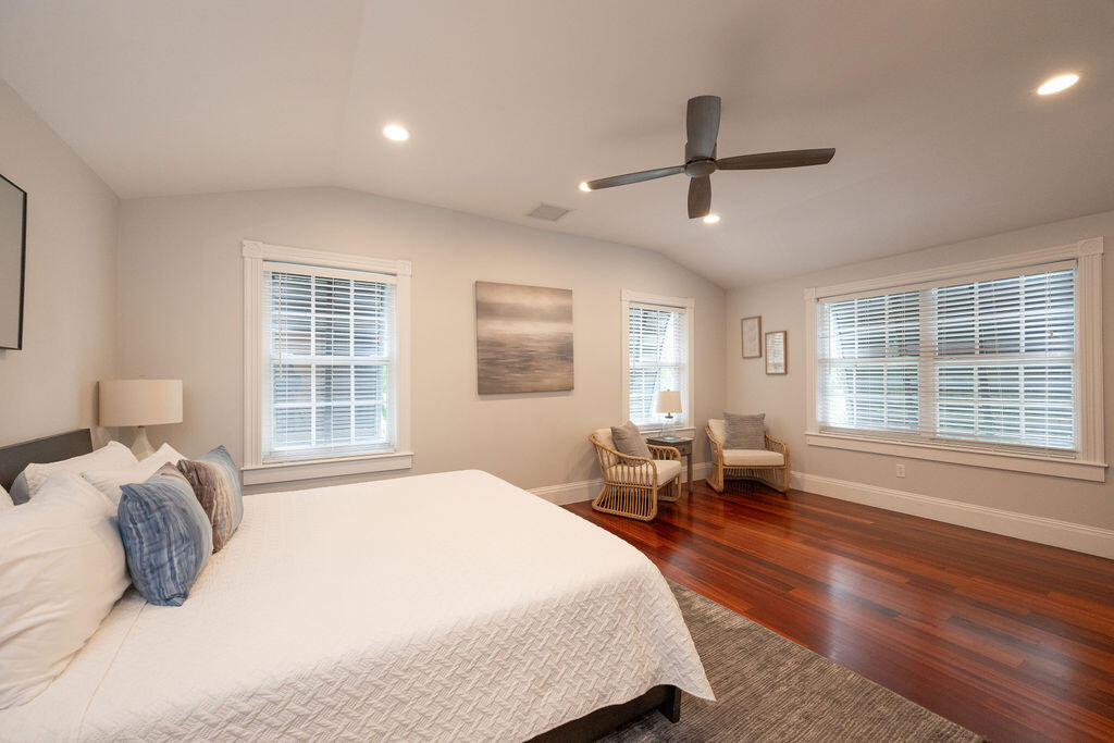1320 South Street Key West, FL 33040 - Photo 24 of 36 a bedroom with a large bed and windows